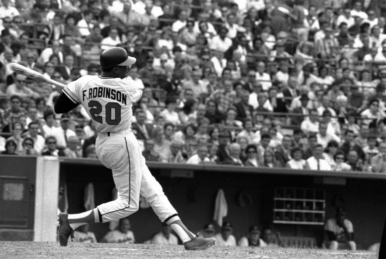 This is a May 19, 1966, file photo showing Baltimore Orioles' Frank Robinson at bat. Hall of Famer Frank Robinson, the first black manager in Major League Baseball and the only player to win the MVP award in both leagues, has died. He was 83. Robinson had been in hospice care at his home in Bel Air. MLB confirmed his death Thursday, Feb. 7, 2019. (AP Photo/File)