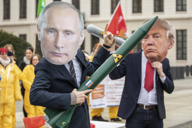 Activists wear masks to look like U.S president Donald Trump and Russian President Vladimir Putin during a protest for the INF treaty in front of the American embassy in Berlin, Germany, February 1, 2019. (Photo by Omer Messinger/Sipa via AP Images)