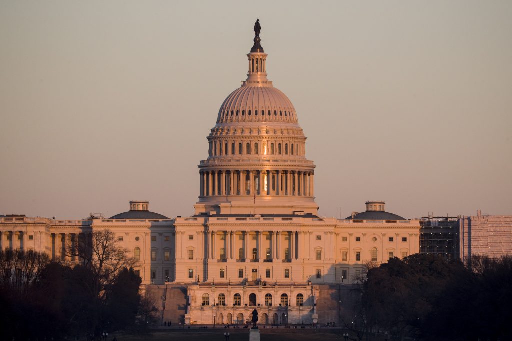 State of Union What to Watch The light from the setting sun is reflected in the windows of the U.S. Capitol, Monday, Feb. 4, 2019, in Washington. (Alex Brandon/AP Photo)