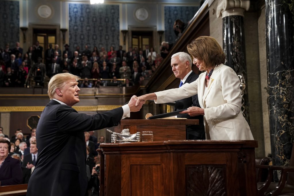 Donald Trump, Nancy Pelosi, Mike Pence President Donald Trump shakes hands with House Speaker Nancy Pelosi as Vice President Mike Pence looks on, as he arrives in the House chamber before giving his State of the Union address to a joint session of Congress, Tuesday, Feb. 5, 2019 at the Capitol in Washington. (Doug Mills/The New York Times via AP, Pool)