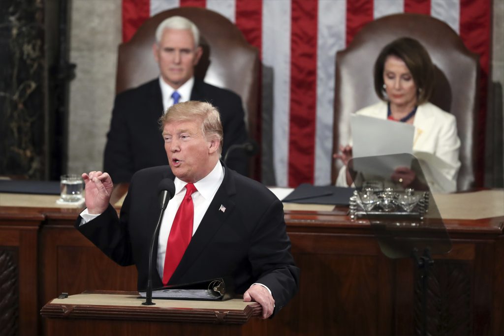 Donald Trump, Mike Pence, Nancy Pelosi President Donald Trump delivers his State of the Union address to a joint session of Congress on Capitol Hill in Washington, as Vice President Mike Pence listens and Speaker of the House Nancy Pelosi, D-Calif., reads the speech, Tuesday, Feb. 5, 2019. (Andrew Harnik/AP Photo)