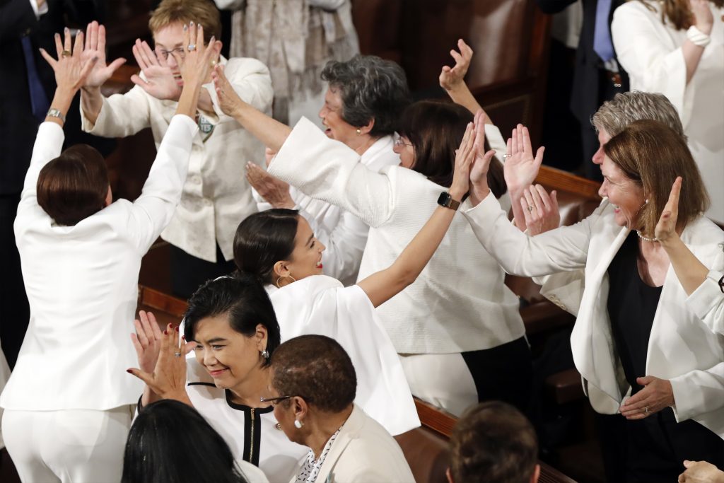 APTOPIX State of Union Women members of Congress, including Rep. Alexandria Ocasio-Cortez, D-N.Y., center, cheer after President Donald Trump acknowledges more women in Congress during his State of the Union address to a joint session of Congress on Capitol Hill in Washington, Tuesday, Feb. 5, 2019. (J. Scott Applewhite/AP Photo)