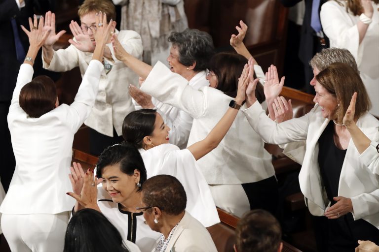 Women members of Congress, including Rep. Alexandria Ocasio-Cortez, D-N.Y., center, cheer after President Donald Trump acknowledges more women in Congress during his State of the Union address to a joint session of Congress on Capitol Hill in Washington, Tuesday, Feb. 5, 2019. (J. Scott Applewhite/AP Photo)