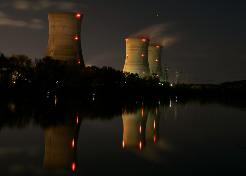 Nuclear Plants-Bailouts In this file photo from Nov. 2, 2006, cooling towers of the Three Mile Island nuclear power plant are reflected in the Susquehanna River in this time exposure photograph in Middletown, Pa. (Carolyn Kaster/AP Photo)