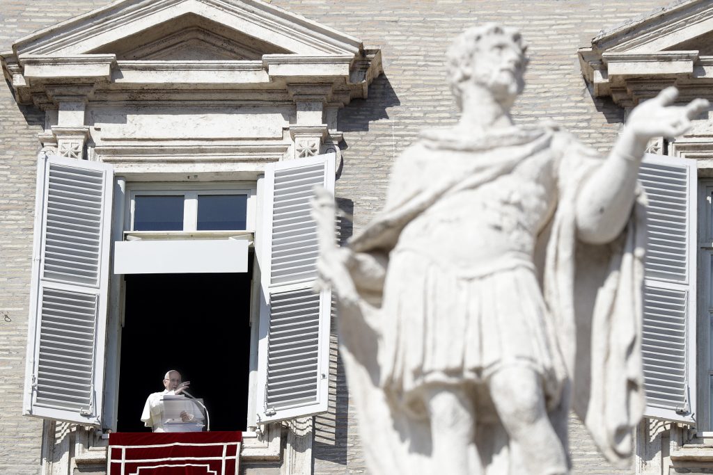 Pope Francis delivers his blessing during the Angelus noon prayer In St. Peter's Square at the Vatican, Sunday, Feb. 17, 2019.