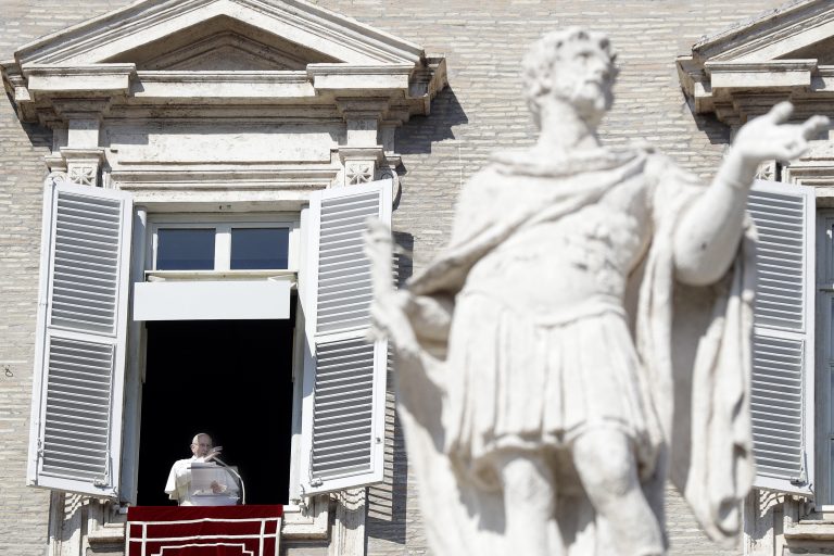 Pope Francis delivers his blessing during the Angelus noon prayer In St. Peter's Square at the Vatican, Sunday, Feb. 17, 2019.