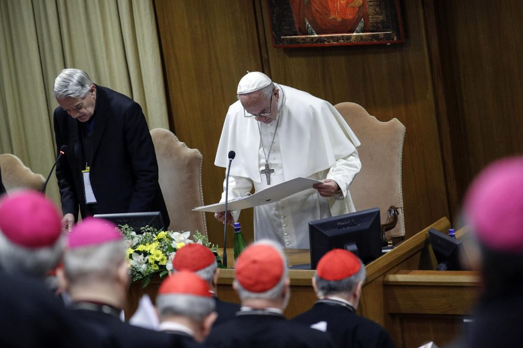 Vatican Sex Abuse Pope Francis prays during the opening of the second day of a Vatican's conference on dealing with sex abuse by priests, at the Vatican, Friday, Feb. 22, 2019. Pope Francis has issued 21 proposals to stem the clergy sex abuse around the world, calling for specific protocols to handle accusations against bishops and for lay experts to be involved in abuse investigations. (Giuseppe Lami/Pool Photo via AP)