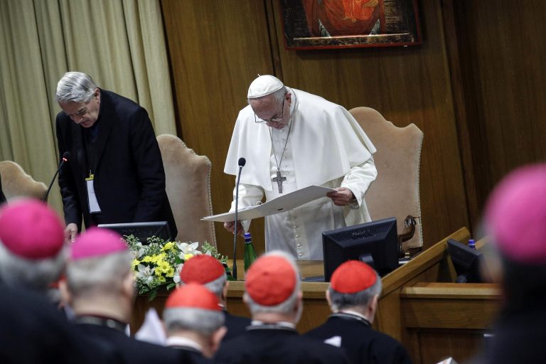 Pope Francis prays during the opening of the second day of a Vatican's conference on dealing with sex abuse by priests, at the Vatican, Friday, Feb. 22, 2019. Pope Francis has issued 21 proposals to stem the clergy sex abuse around the world, calling for specific protocols to handle accusations against bishops and for lay experts to be involved in abuse investigations. (Giuseppe Lami/Pool Photo via AP)