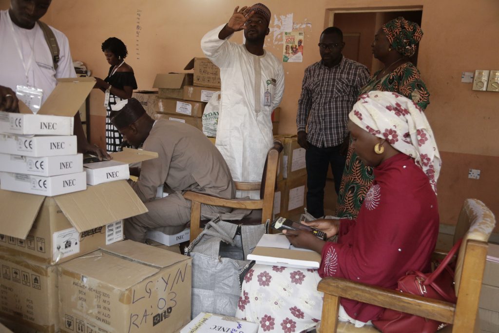 Nigeria Election Electoral workers prepare identity card and biometric verification readers, at the offices of the local Independent National Electoral Commission office in Yola Nigeria, Friday, Feb. 22, 2019. (Sunday Alamba/AP Photo)