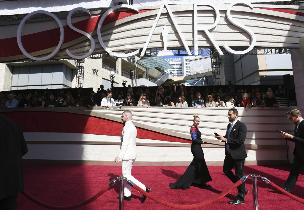 91st Academy Awards – Arrivals File photo: Media walk on the red carpet before the Oscars on Sunday, Feb. 24, 2019, at the Dolby Theatre in Los Angeles. (Photo by Jordan Strauss/Invision/AP)