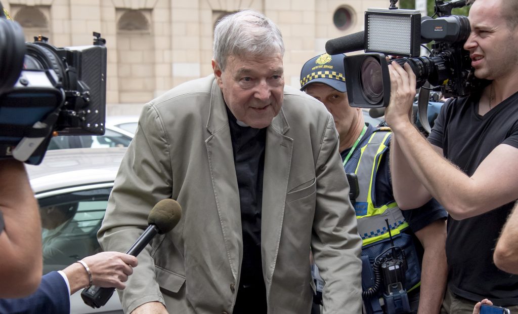 Cardinal George Pell arrives at the County Court in Melbourne, Australia, Tuesday. The most senior Catholic cleric ever charged with child sex abuse has been convicted of molesting two choirboys moments after celebrating Mass, dealing a new blow to the Catholic hierarchy's credibility after a year of global revelations of abuse and cover-up. (AP Photo/Andy Brownbill)