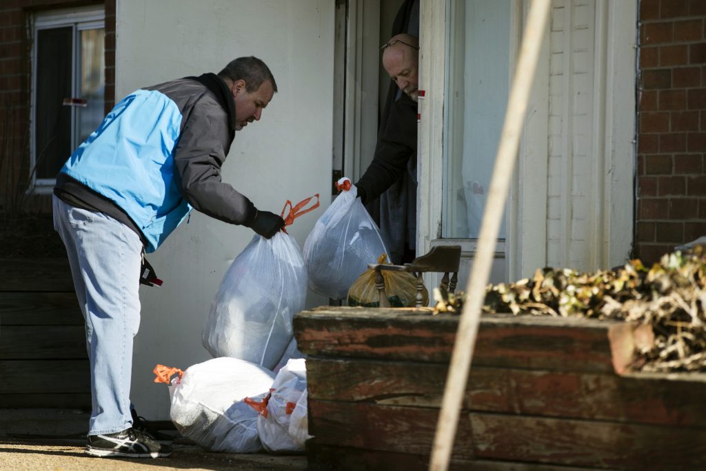 Family Members Killed Investigators remove bags from a crime scene at the Robert Morris Apartments in Morrisville, Pa., Tuesday, Feb. 26, 2019. A Pennsylvania woman charged along with her teenage daughter in the deaths of multiple relatives, including children, was arraigned Tuesday on murder charges. The bodies were found Monday inside an apartment at the complex. (Matt Rourke/AP Photo)