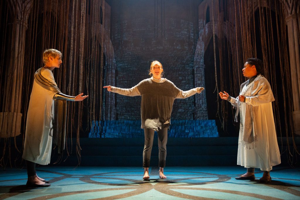 Saint Joan Clare O’Malley (center) delivers a sweet, searing Joan who dazzles all with her confidence and determination in Delaware Theatre Company's production of