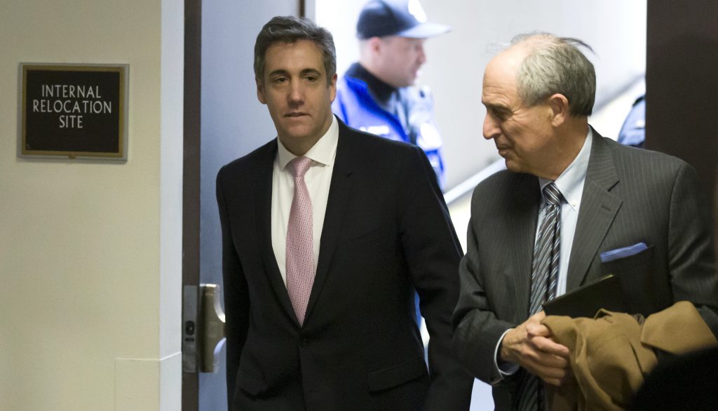 Michael Cohen (left), President Trump’s former lawyer, arrives to testify before a closed hearing of the Senate intelligence committee, with his lawyer Lanny Davis on Tuesday. Michael Cohen (left), President Trump's former lawyer, arrives to testify before a closed hearing of the Senate intelligence committee, with his lawyer Lanny Davis on Tuesday. (Alex Brandon/AP)
