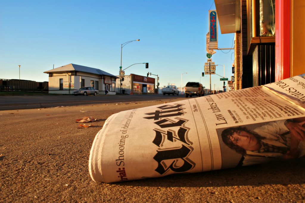 file-20190208-174880-1rvajzk Local newspapers keep readers’ interest on local politics. (Shutterstock/Bridget McPherson)