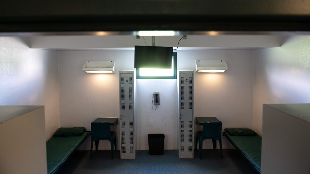 A bunk bed and desks are seen inside a cell at a Virginia detention center contracted by ICE. (Saul Loeb/AFP/Getty Images)