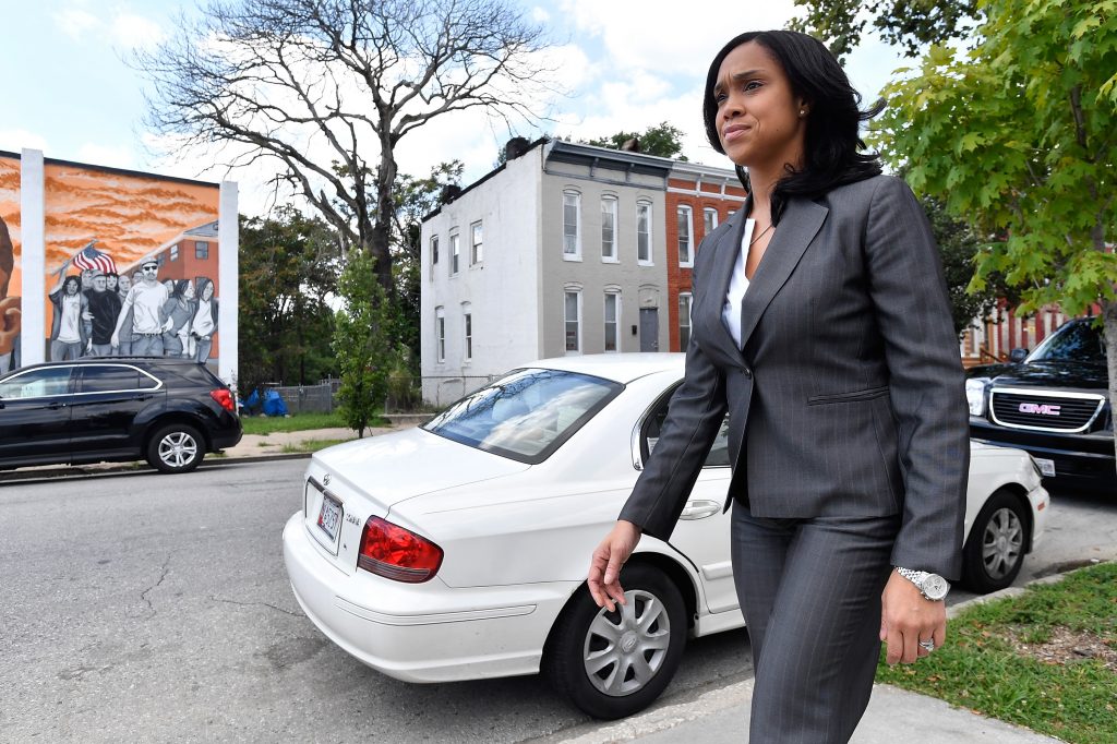 Baltimore State's Attorney Marilyn Mosby walks through a city neighborhood on August 24, 2016. (Larry French/Getty Images)