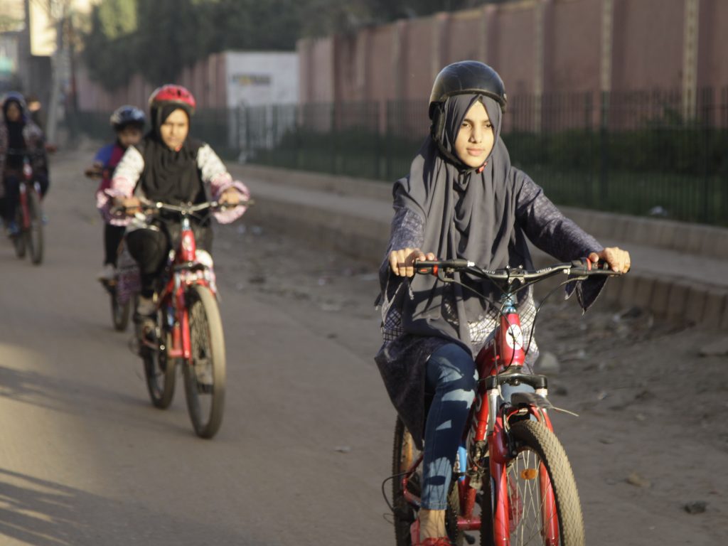 Zulekha Dawood leads the group of female cyclists through the impoverished Lyari neighborhood in Karachi, Pakistan’s capital. They ride early in the morning to avoid the worst of the traffic. Zulekha Dawood leads the group of female cyclists through the impoverished Lyari neighborhood in Karachi, Pakistan's capital. They ride early in the morning to avoid the worst of the traffic. (Diaa Hadid/NPR)