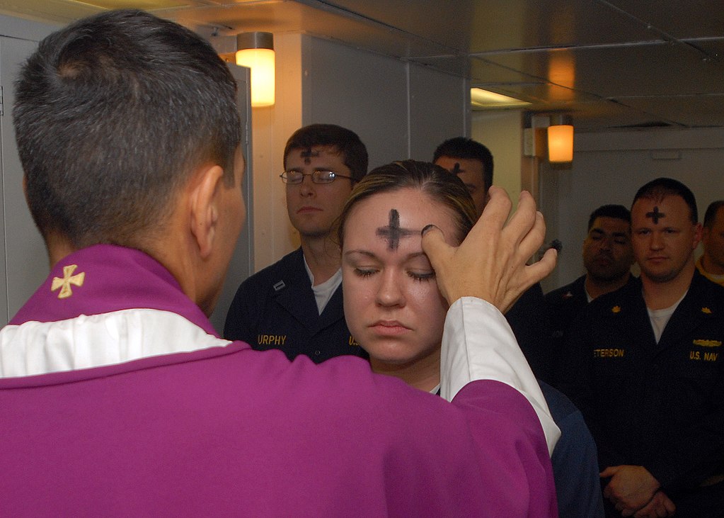1024px-US_Navy_080206-N-7869M-057_Electronics_Technician_3rd_Class_Leila_Tardieu_receives_the_sacramental_ashes_during_an_Ash_Wednesday_celebration US Navy employees receive the sacramental ashes during an Ash Wednesday celebration (U.S. Navy photo by Mass Communication Specialist 3rd Class Brian May/Public domain)
