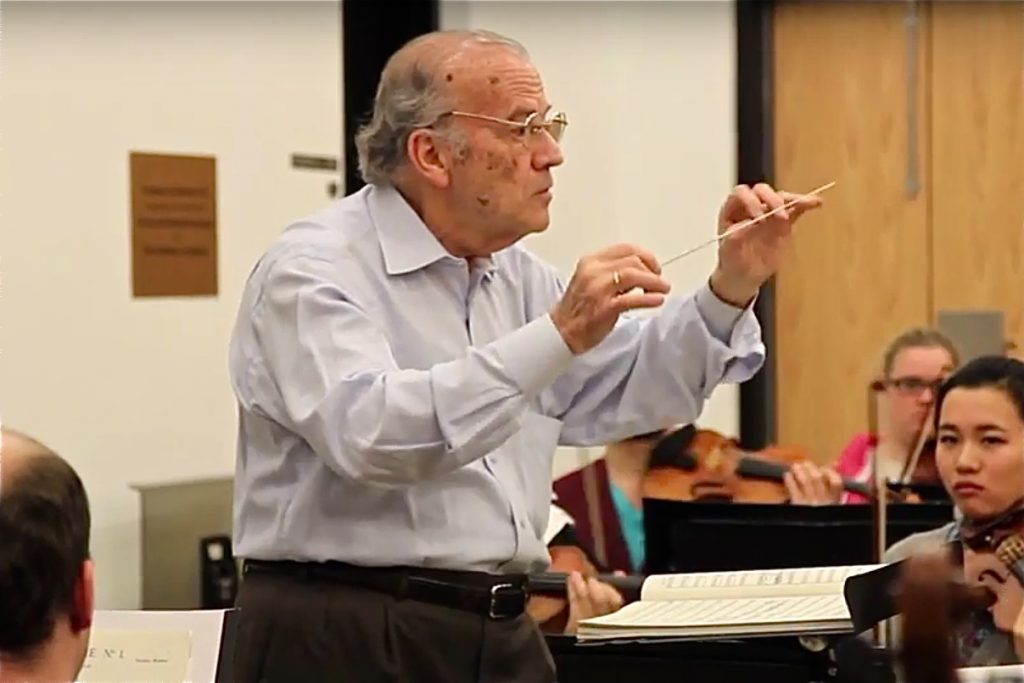 2014 03 20-k paynter screengrab from video-luis biava-temple university-last concert rehearsal Temple music professor and orchestra conductor Luis Biava irehearses with the Temple University Symphony Orchestra on March 20, 2014, shortly before his retirement. (Kimberly Paynter/WHYY)