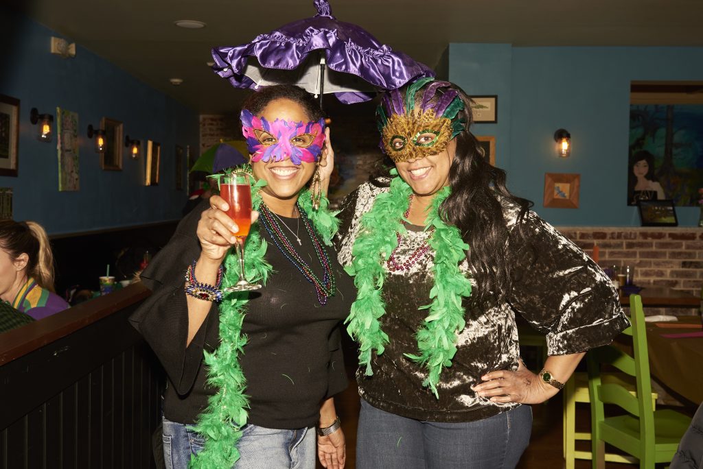 2019 03 05-n piserchio-marki levere deenee levere-philadelphia south philadelphia acadia bar-mardi gras- 25 Marki and Deenee Levere celebrate Fat Tuesday at Acadia Bar in South Philadelphia. (Natalie Piserchio for WHYY)