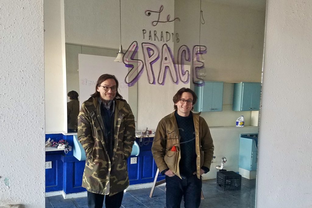 2019 03 05-p crimmins-maximillian lawrence john armstrong-philadelphia space 1026-artists collective buys its own space Members of the artists' collective Space 1026 Maximillian Lawrence (left) and John Armstrong, stand in the new space they purchased on North Broad Street, a former hairdresser's shop. (Peter Crimmins/WHYY)