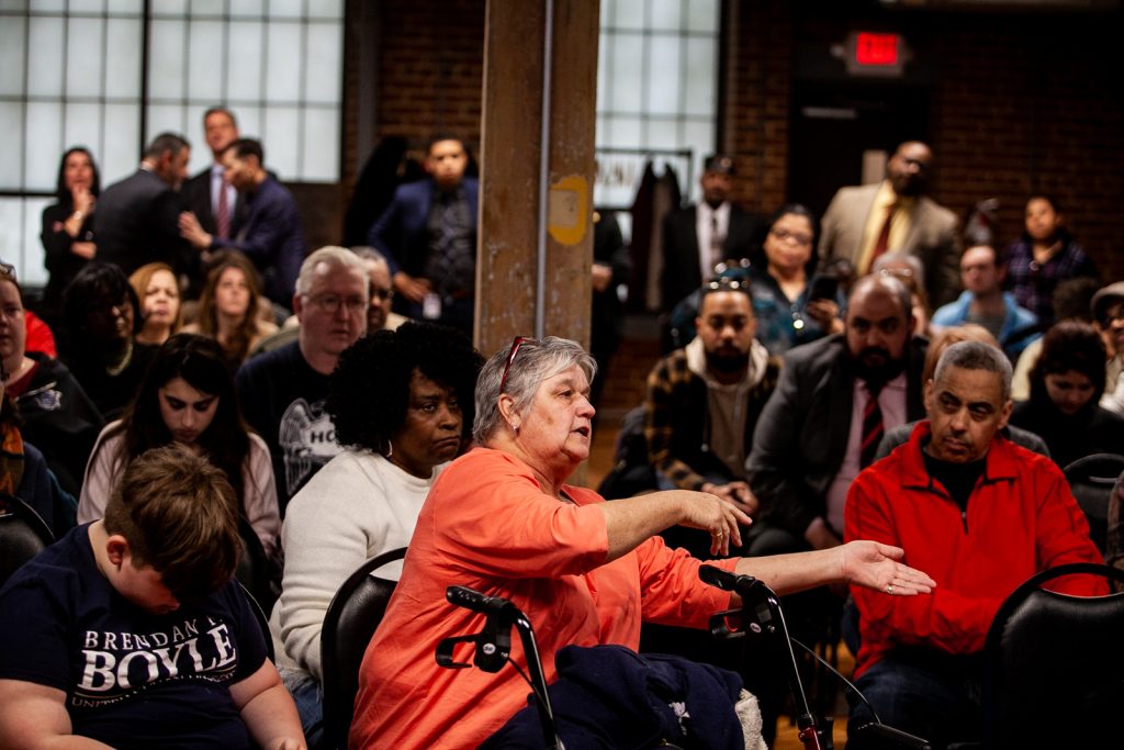 2019 3 26- b larrison- philadelphia- attorney general josh shapiro managing director brian abernathy- ag josh shapiro and city officials provide updates on combating the opiod crisis-6 Kensington resident Donna Aument voiced her opposition to a proposed supervised injection site at a meeting to update residents on the ongoing Philadelphia Resilience Project's efforts in combating the opioid epidemic. (Brad Larrison for WHYY)