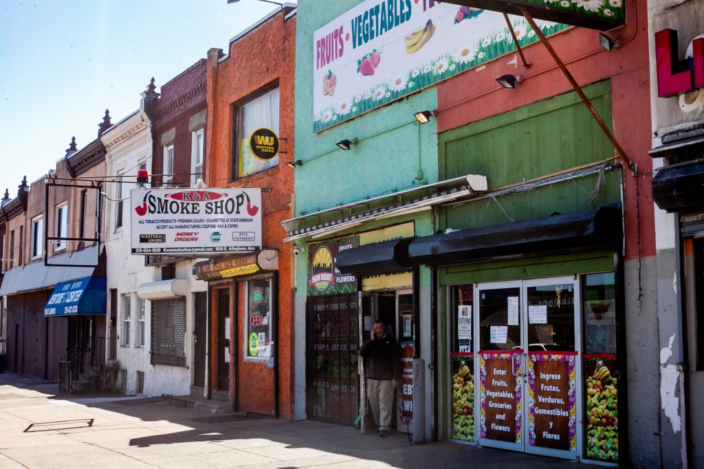 2019 3 26- b larrison- philadelphia- impact services providing money for new small business development in kensington-6 Abdelmgeed Muhammad Elgamel stands outside of his produce market on Allegheny Avenue in Kensington. (Brad Larrison/WHYY)