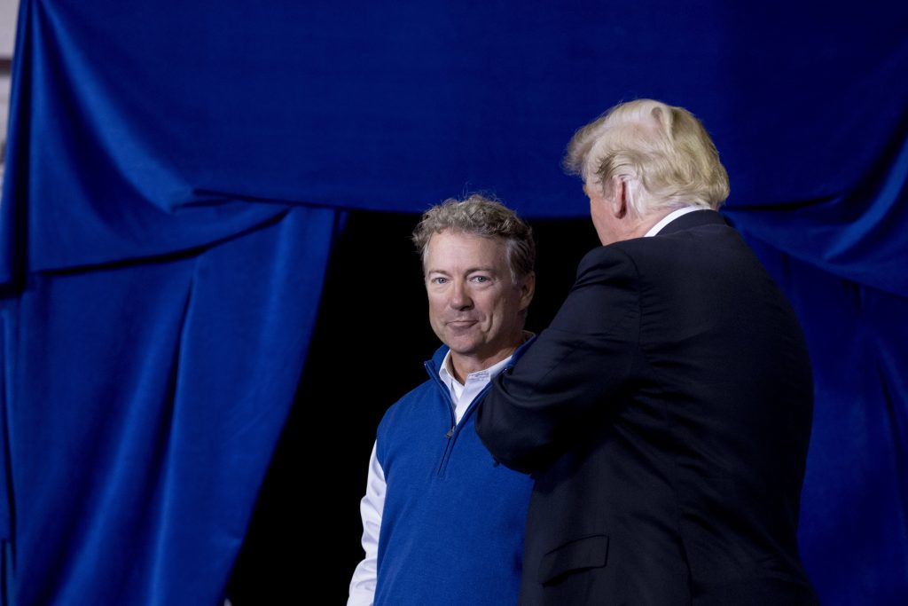 Donald Trump In this file photo, Sen. Rand Paul, R-Ky., is brought up on stage by President Donald Trump as he takes the stage at a rally at Alumni Coliseum in Richmond, Ky., Saturday, Oct. 13, 2018. (Andrew Harnik/AP Photo)