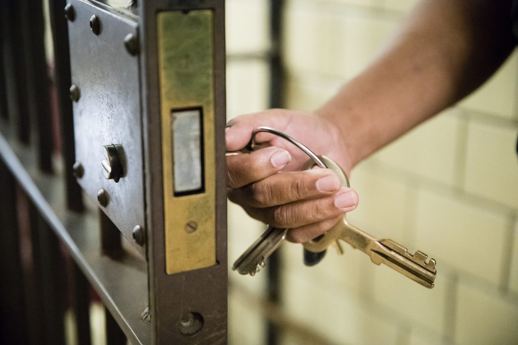 MacArthur Grants Prisoner Reduction In this Tuesday, Oct. 23, 2018 photo, a guard opens a gate at the deactivated House of Correction in Philadelphia. (AP Photo/Matt Rourke)