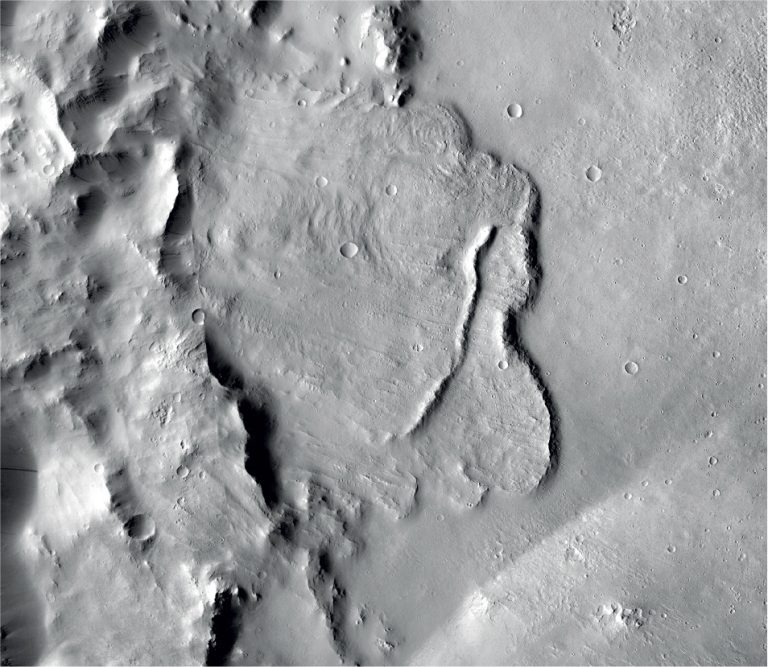 This undated photo provided by the European Space Agency, ESA, shows the surface of the Mars. Scientists say images of Martian craters taken by European and American space probes show there likely once was a planet-wide system of underground lakes. (NASA/JPL-Caltech/MSSS via AP)