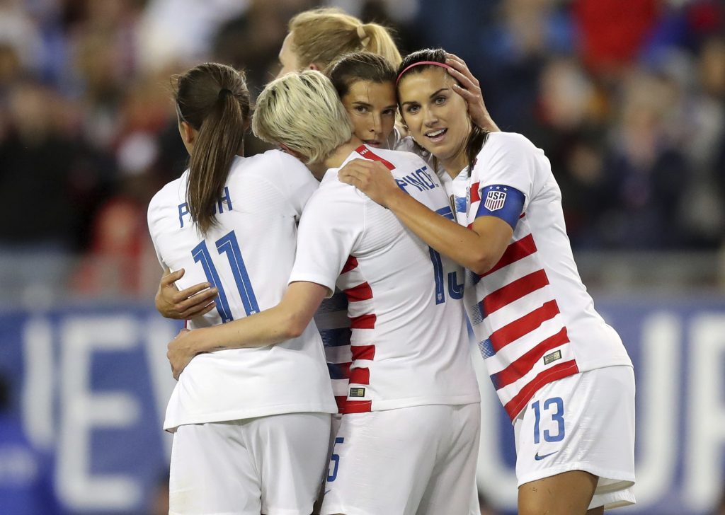 United States' Tobin Heath, (second from right), is congratulated on her goal by Mallory Pugh (11), Megan Rapinoe and Alex Morgan (13) during the first half of a SheBelieves Cup soccer match against Brazil Tuesday, March 5, 2019, in Tampa, Fla. (Mike Carlson/AP Photo)