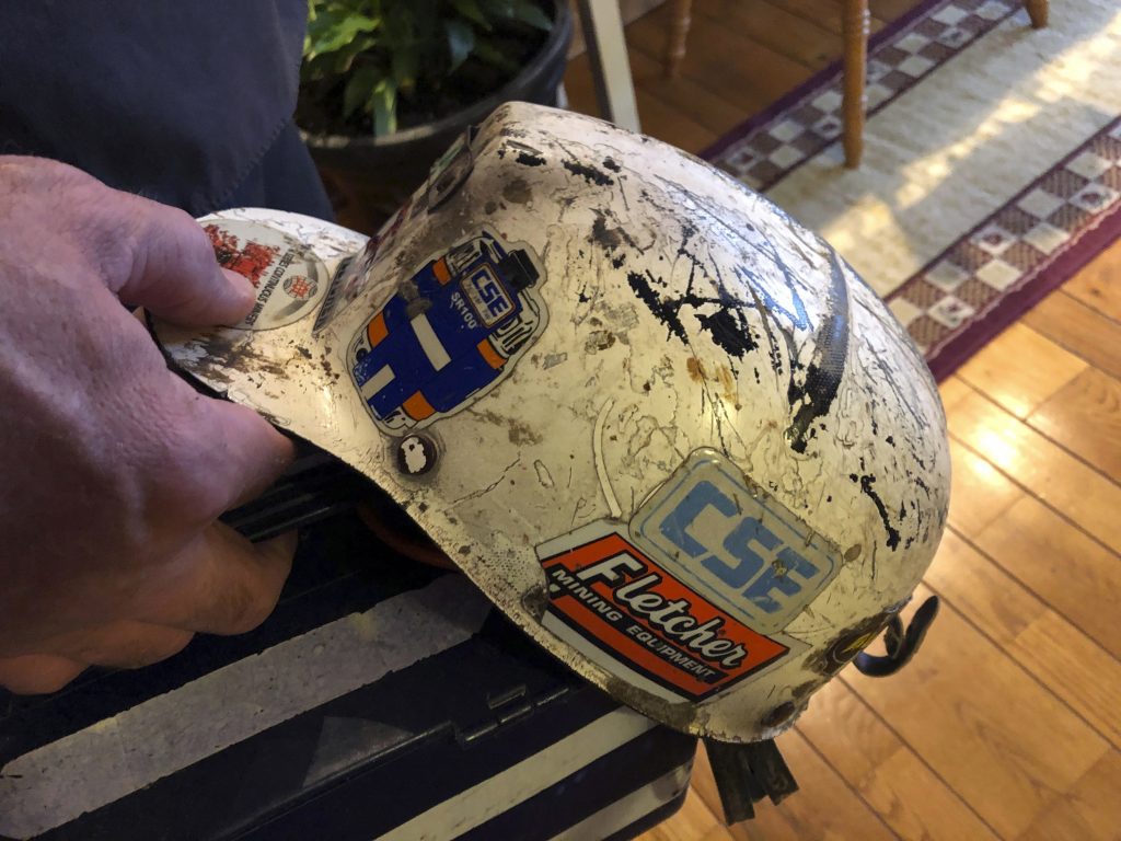 Black Lung Disease-Fund Retired coal miner John Robinson displays his mining helmet at his home in Coeburn, Va., on Thursday, Jan. 24, 2019. Robinson was 47 when he was diagnosed with black lung disease, part of a new generation of black lung sufferers who are contracting the deadly disease at younger ages. (Dylan Lovan/AP Photo)