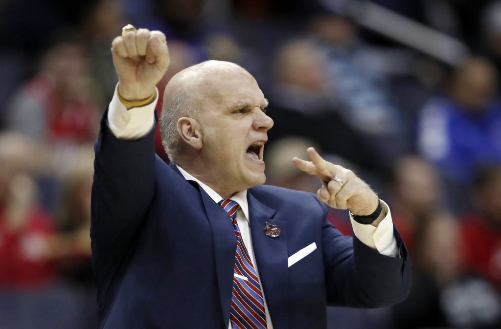 Phil Martelli In this March 10, 2018, file photo Saint Joseph's head coach Phil Martelli directs his team during the first half of an NCAA college basketball semifinal game against Rhode Island in the Atlantic 10 Conference tournament in Washington. Saint Joseph's fired Martelli on Tuesday, March 19, 2019, after 24 seasons. The 64-year-old Martelli became head coach in 1995 after 10 years as an assistant. (Alex Brandon/AP Photo, File)