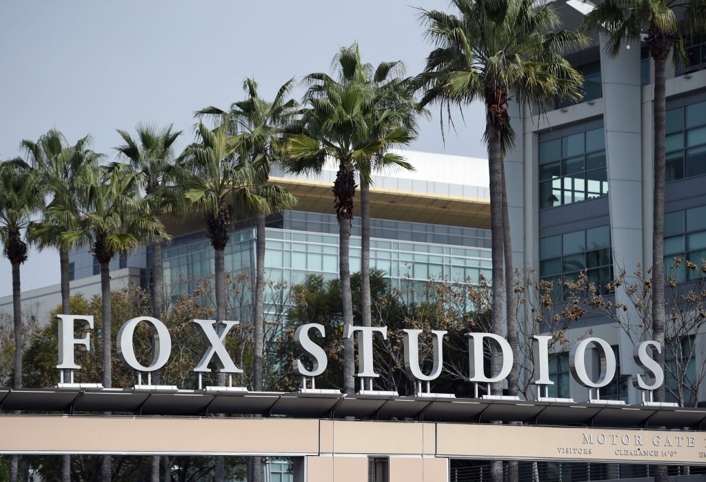 Film Fox Disney The Fox Studios sign is pictured at the entrance to the lot, Tuesday, March 19, 2019, in Los Angeles. Disney's $71.3 billion acquisition of Fox's entertainment assets is set to close around 12 a.m. EDT on Wednesday. (Chris Pizzello/AP Photo)