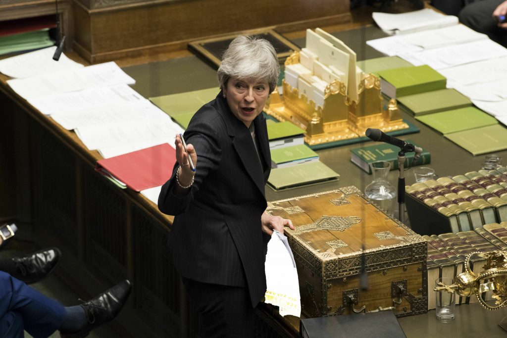 Britain Brexit In this handout photo made available by UK Parliament, Britain's Prime Minister Theresa May speaks during Prime Minister's Questions in the House of Commons, London, Wednesday March 20, 2019. Exactly 1,000 days after Britain voted to leave the European Union, and nine days before it is scheduled to walk out the door, Prime Minister Theresa May hit the pause button Wednesday, asking the bloc to postpone the U.K.'s departure until June 30. (UK Parliament/Mark Duffyvia AP)