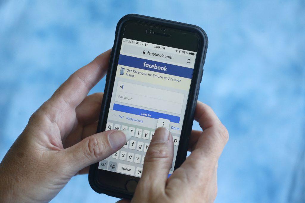 Facebook Passwords In this Aug. 21, 2018, file photo a Facebook start page is shown on a smartphone in Surfside, Fla. Facebook said Thursday, March 21, 2019, that it stored millions of its users’ passwords in plain text for years. The acknowledgement from the social media giant came after a security researcher posted about the issue online. (Wilfredo Lee/AP Photo, File)