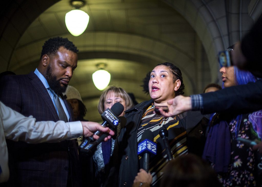 Pennsylvania Police Shooting Rose family attorney, S. Lee Merritt, (left), and Michelle Kenney, (center), mother of Antwon Rose II, address members of the media following the closing arguments in the homicide trial of former East Pittsburgh Police officer Michael Rosfeld, Friday, March 22, 2019, at the Allegheny County Courthouse in Pittsburgh. (Nate Smallwood/Pittsburgh Tribune-Review via AP, Pool)