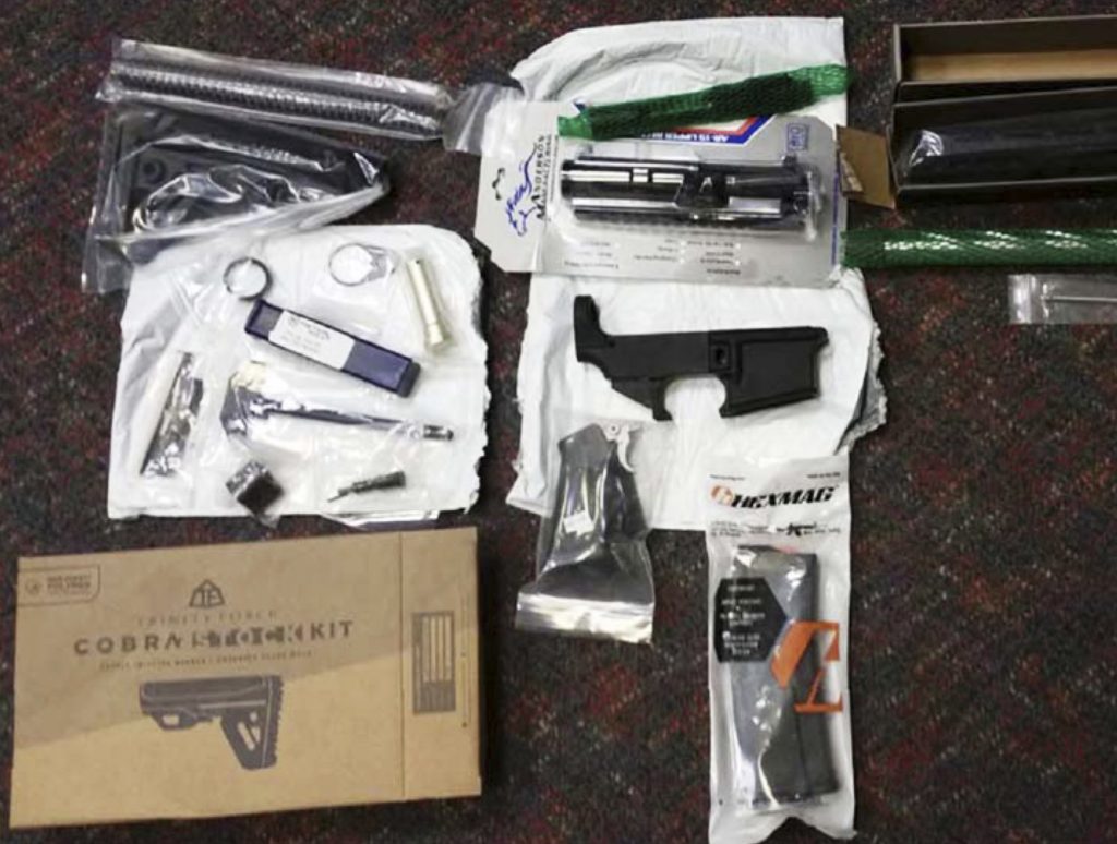 Ghost Guns New Jersey This undated photo provided by the Office of Attorney General of New Jersey shows parts of guns confiscated after being sold by mail order from a California company. New Jersey's attorney general announced a lawsuit Friday, March 22, 2019, against the California company that sells mail-order firearms parts that can be turned into working weapons, the first such action the state has taken since it banned so-called