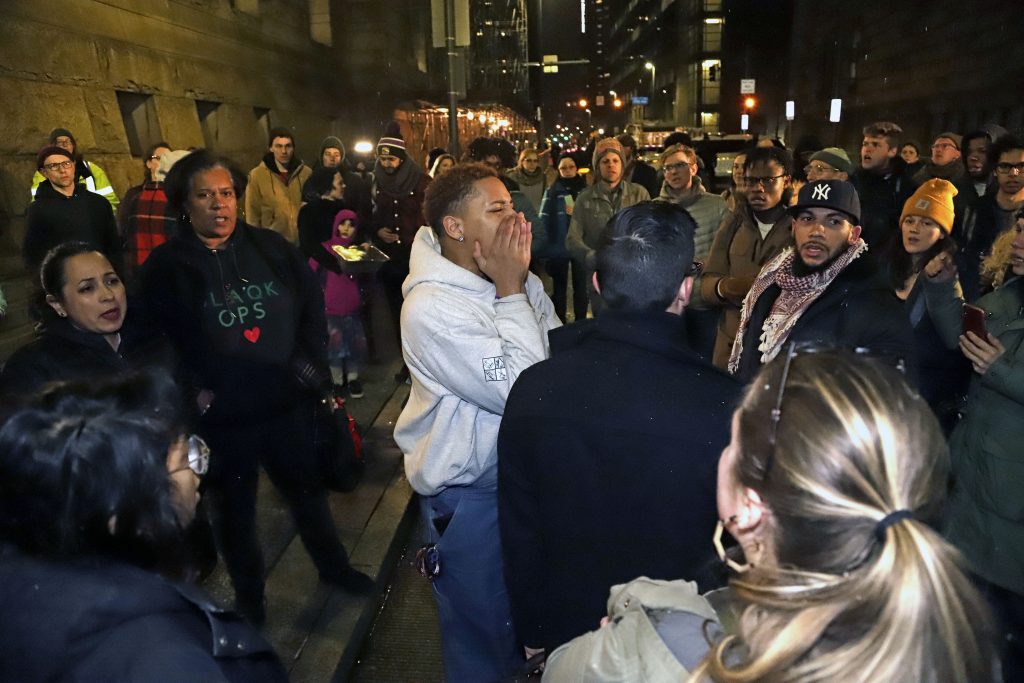 Pennsylvania Police Shooting Supporters of Antwon Rose II, gather outside the Allegheny County Courthouse after hearing the verdict of not guilty on all charges for Michael Rosfeld, a former police officer in East Pittsburgh, Pa., Friday, March 22, 2019. Rosfeld is charged with homicide in the fatal shooting of Antwon Rose II as he fled during a traffic stop on June 19, 2018. (Gene J. Puskar/AP Photo)
