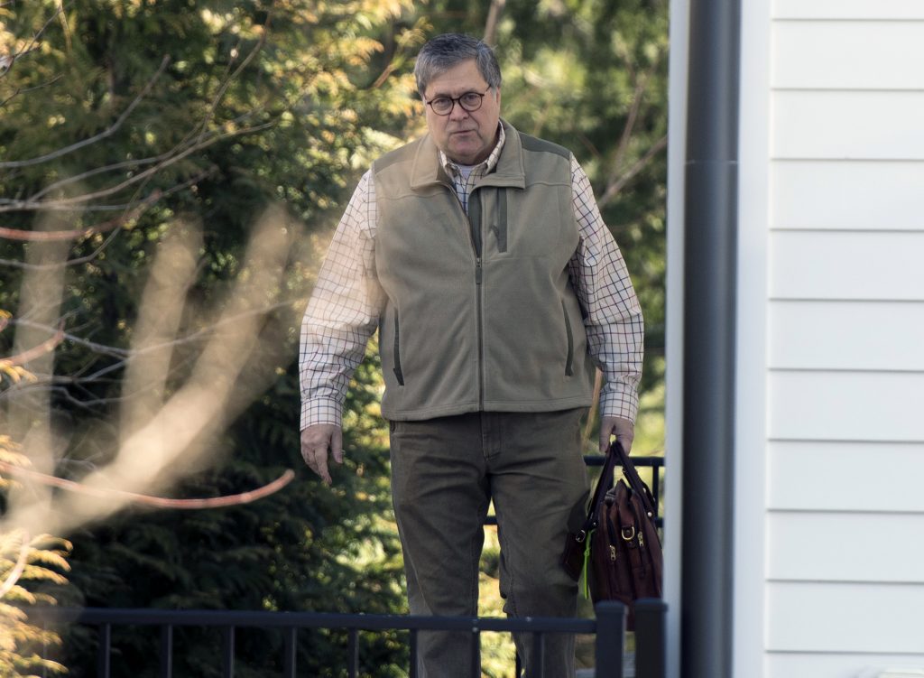 Attorney General William Barr leaves his home in McLean, Va., on Sunday morning, March 24, 2019. Barr is preparing a summary of the findings of the special counsel investigating Russian election interference.  The release of Barr's summary of the report's main conclusions is expected sometime Sunday. (Sait Serkan Gurbuz/AP Photo)