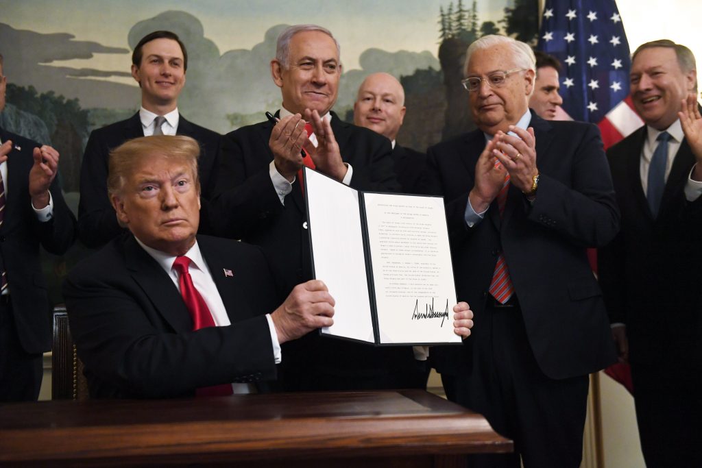 Donald Trump President Donald Trump holds up a signed proclamation recognizing Israel's sovereignty over the Golan Heights, as Israeli Prime Minister Benjamin Netanyahu looks on in the Diplomatic Reception Room of the White House in Washington, Monday, March 25, 2019. (Susan Walsh/AP Photo)