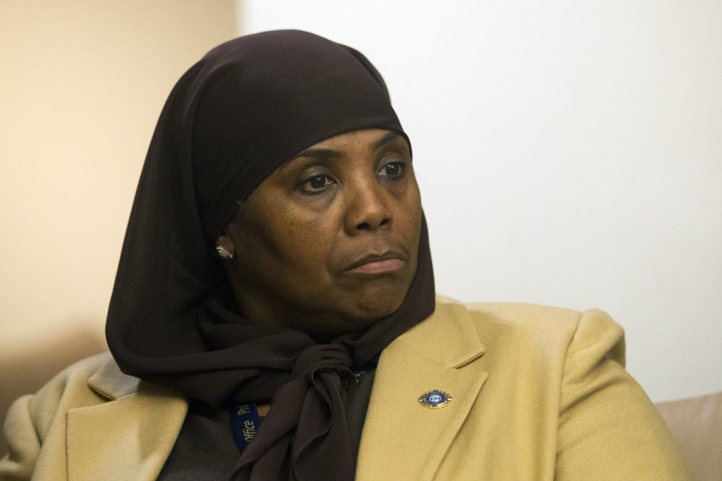 Legislature-Christian Invocation-Muslim In this Jan. 9, 2018 photo, Movita Johnson-Harrell, Interim Supervisor of Victim Services, looks on after getting introduced, during a press conference at the District Attorney's Office in Philadelphia. Johnson-Harrell, the first female Muslim member of the Pennsylvania House of Representatives, said Tuesday, March 26, 2019, she was offended by a colleague's decision to open a voting session with a prayer a day earlier that