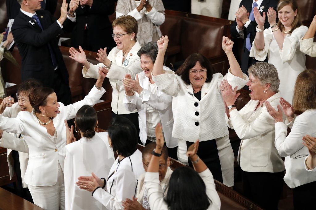 Women in Politics In this Feb. 5, 2019 file photo, women members of Congress cheer after President Donald Trump acknowledges more women in Congress during his State of the Union address to a joint session of Congress on Capitol Hill in Washington. A new survey finds acceptance of women in American politics and the workforce is at a record high. (J. Scott Applewhite/AP Photo)