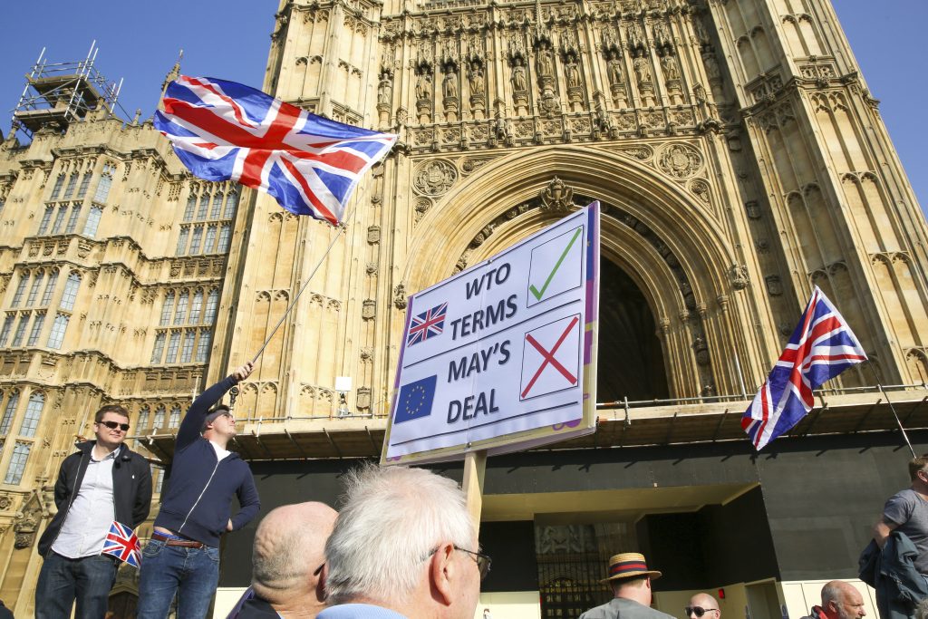 March to Leave Protest in London, UK – 29 Mar 2019 Protesters are seen with placards and Union Jack flags in front of Victoria Tower during the demonstration. Leave campaigners protest against the delay to Brexit, on the day that UK was due to leave the European Union. British Prime Minister Theresa May's Brexit deal was defeated for a third time by a margin of 58 votes. (Photo by Dinendra Haria/SOPA Images/Sipa USA via AP Images)