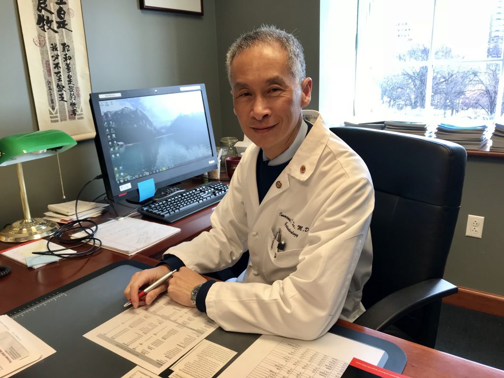 Dr. Immanuel K. Ho, MD, 
Director of Interventional Endoscopy, in his office at Pennsylvania Hospital.  (Jennifer Lynn/WHYY) 