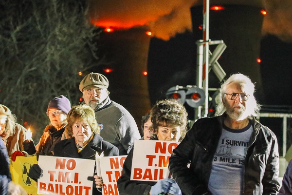 Three_mile_island_vigil2_witf Protesters gather for a vigil outside the north gate of the Three Mile Island nuclear power plant in Londonderry Township, Dauphin County. (Tim Lambert/WITF)