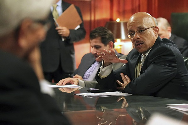 Sen. Vincent Hughes, D-Philadelphia, makes a point as they discuss pension legislation in the Rules Committee ahead of floor debate at the state Capitol in Harrisburg, Pa., Tuesday, June 30, 2015. (Chris Knight/AP Photo)