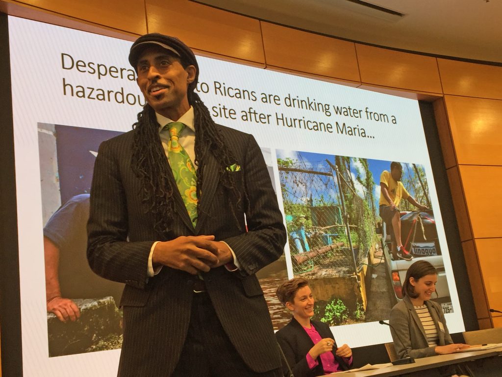 WHYYDBwaterx1200 Mustafa Santiago Ali (left) discusses water system vulnerabilities in the U.S. with Zoe Roller (middle) and Emily Kutil (right) at the 12th Annual Global Water Alliance Conference. (Dana Bate/WHYY)