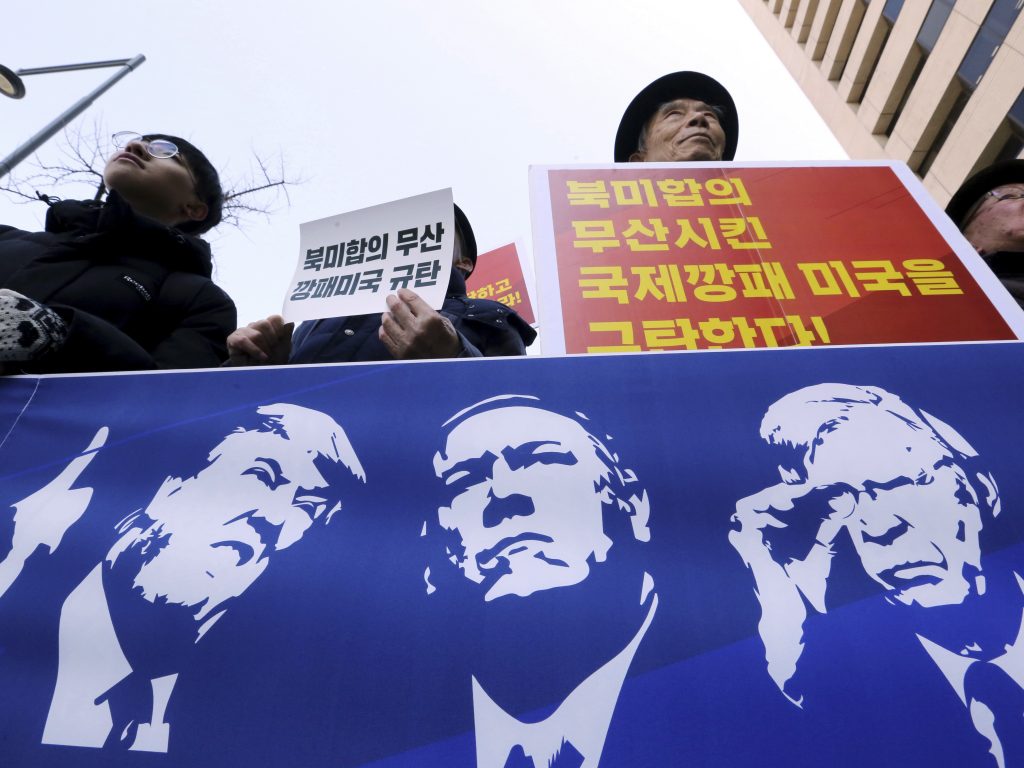 Protesters hold a banner showing images, of President Trump, Secretary of State Mike Pompeo, and National Security Adviser John Bolton during a rally against U.S. sanctions on North Korea, near the U.S. Embassy in Seoul, South Korea. Protesters hold a banner showing images, of President Trump, Secretary of State Mike Pompeo, and National Security Adviser John Bolton during a rally against U.S. sanctions on North Korea, near the U.S. Embassy in Seoul, South Korea. (Ahn Young-joon/AP)